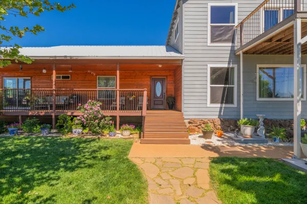 a view of balcony with wooden floor and outdoor space