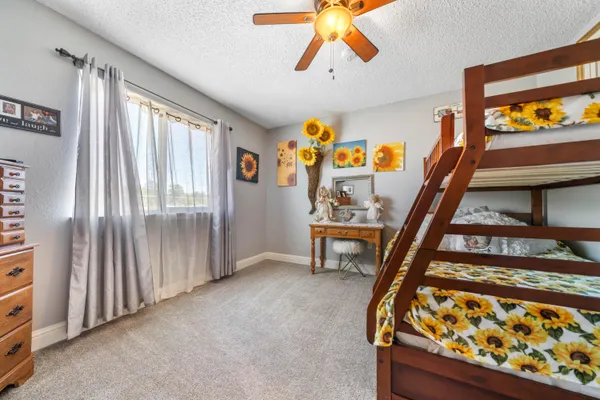 a view of a backyard of the house