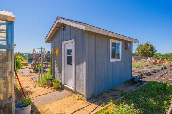 a view of a road with a building in the background