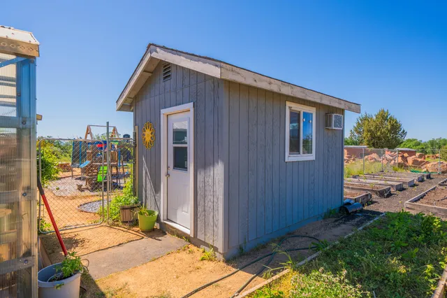 a view of a road with a building in the background