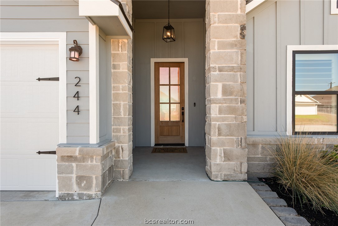 244 Brazos Bend Snook, TX 77879 - Photo 3 of 33 a view of an entrance door of the house
