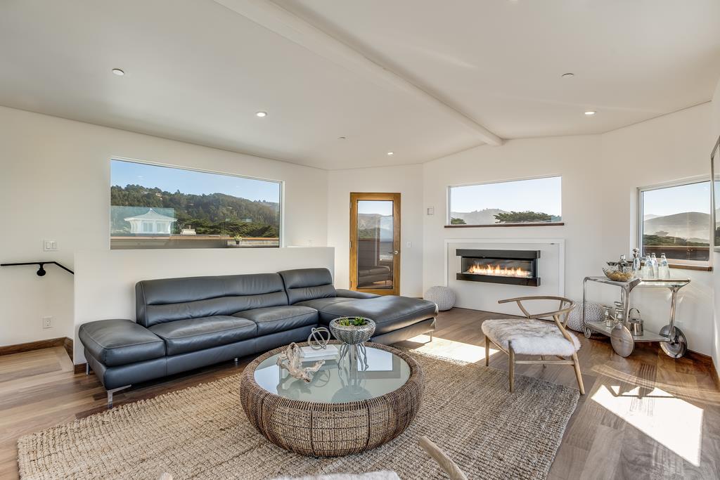 61 Elder Lane Pacifica, CA 94044 - Photo 21 of 37 a living room with furniture and a fireplace