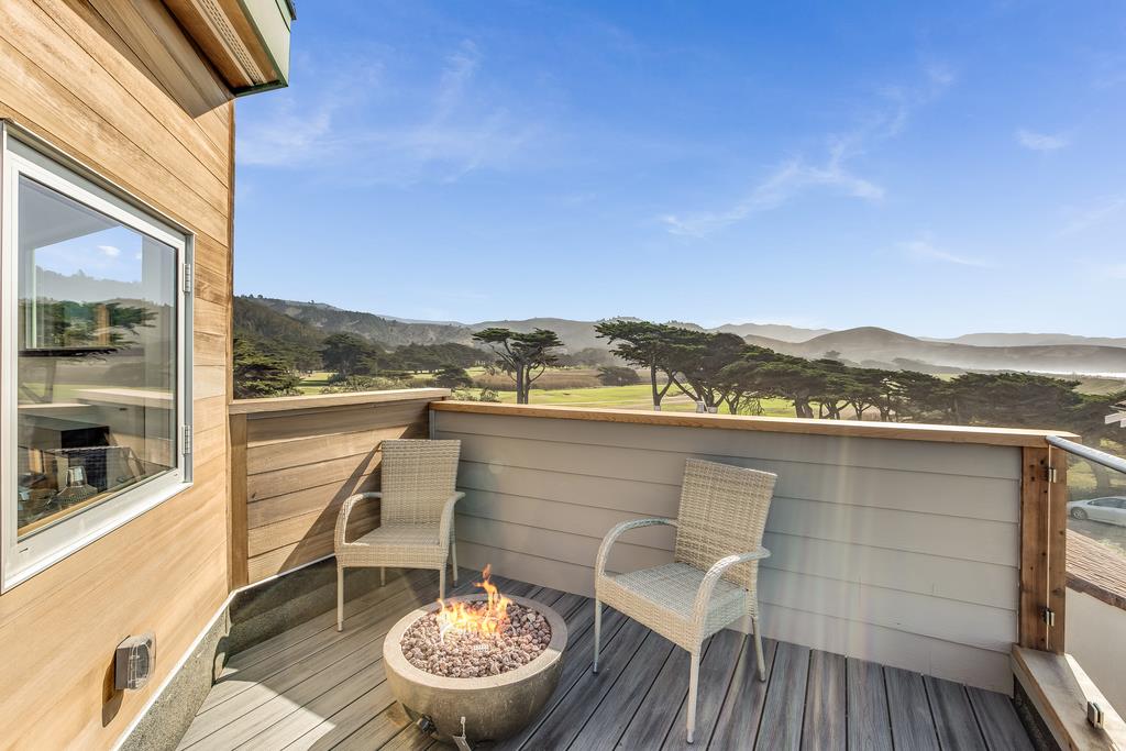 61 Elder Lane Pacifica, CA 94044 - Photo 25 of 37 a view of a balcony with mountain view and wooden floor