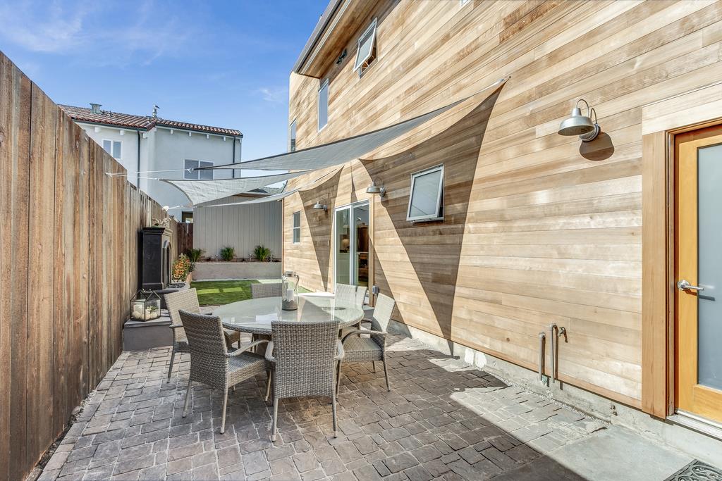 61 Elder Lane Pacifica, CA 94044 - Photo 27 of 37 a view of a dining room with furniture and a window