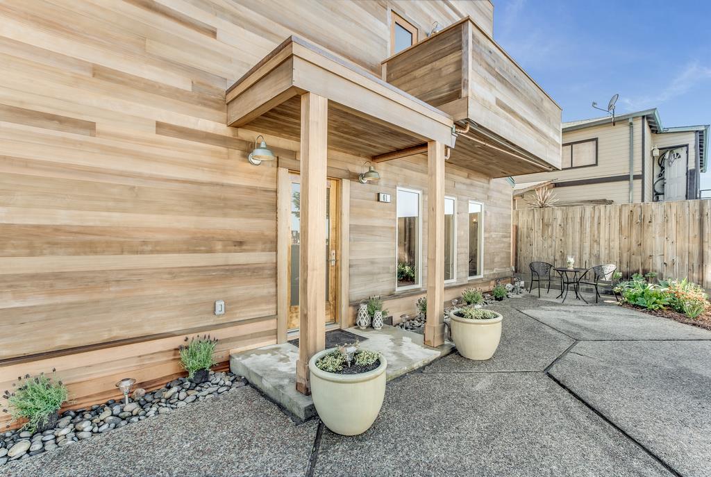 61 Elder Lane Pacifica, CA 94044 - Photo 3 of 37 a view of a patio with couple of chairs and a potted plant