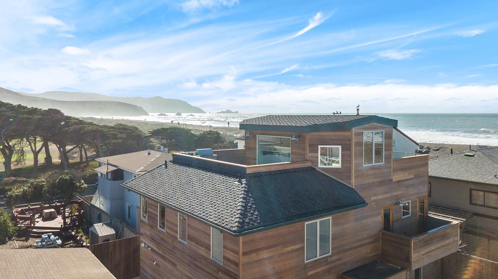 61 Elder Lane Pacifica, CA 94044 - Photo 31 of 37 a front view of a house with a yard