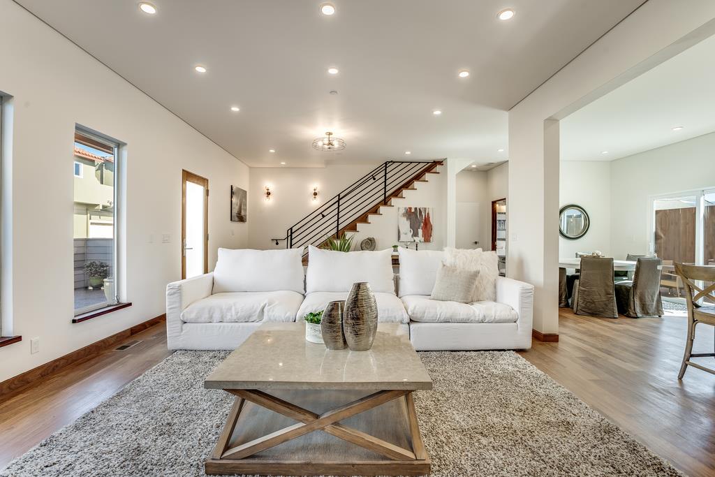61 Elder Lane Pacifica, CA 94044 - Photo 7 of 37 a living room with furniture and a table