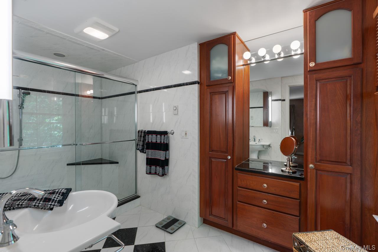 185 Taylor Road Mountainville, NY 10953 - Photo 31 of 47 Elegant bathroom with custom-designed built in cherry cabinetry