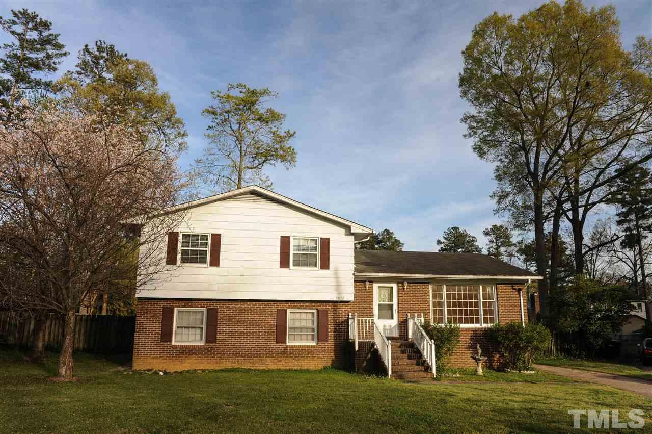 3012 Oldham Court Raleigh, NC 27604 - Photo 1 of 19 a front view of house with yard outdoor seating and green space