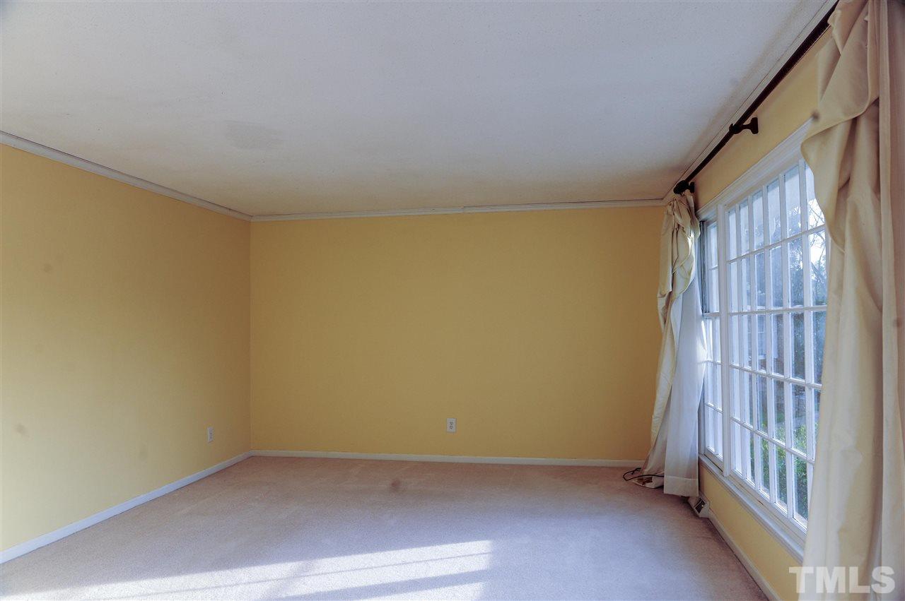 3012 Oldham Court Raleigh, NC 27604 - Photo 11 of 19 an empty room with a window