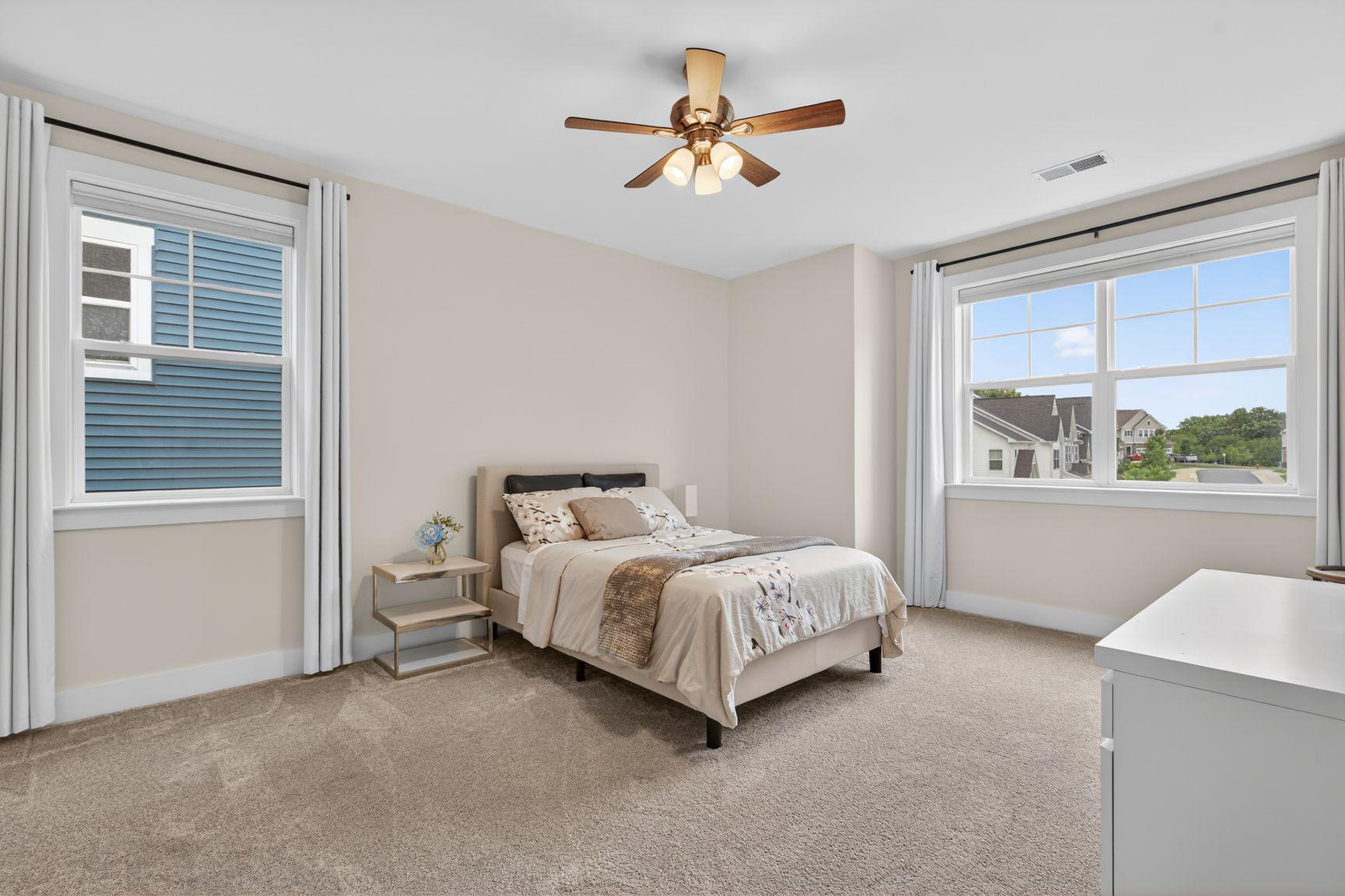 6213 Mcconnell Lane Springfield, VA 22152 - Photo 24 of 39 a bedroom with a bed and a large window