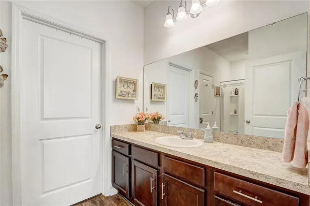 a bathroom with a shower and a toilet