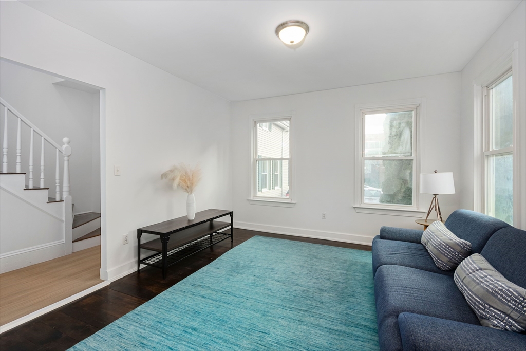 79 Brookline Street Lynn, MA 01902 - Photo 7 of 27 a living room with furniture and a window