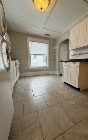 a view of a storage & utility room in a kitchen