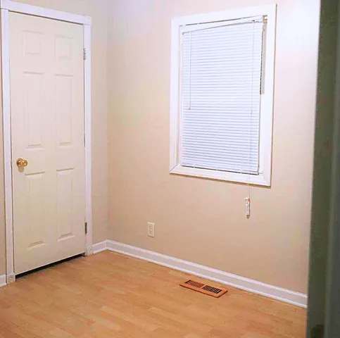 an empty room with a window