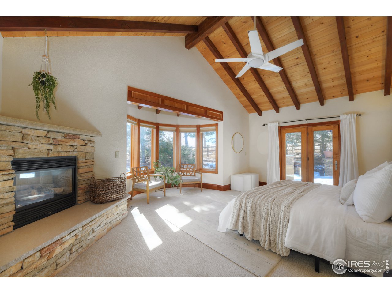 2966 Middle Fork Road Boulder, CO 80302 - Photo 12 of 40 Master Bedroom with Fireplace