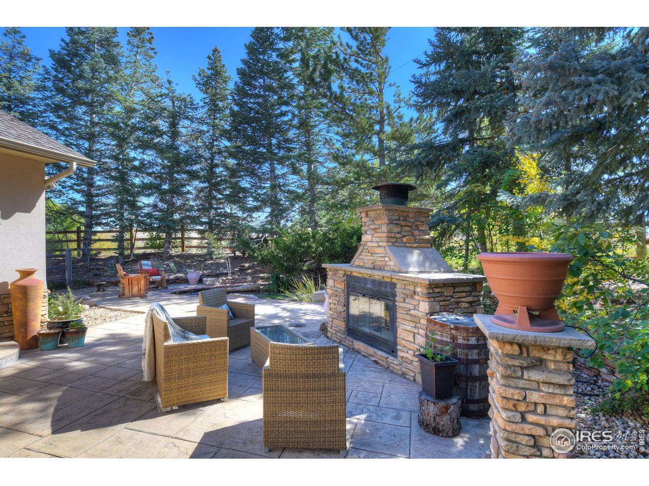 2966 Middle Fork Road Boulder, CO 80302 - Photo 23 of 40 Relax by the Outdoor Fireplace