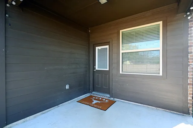 a view of a room with rack on the wall