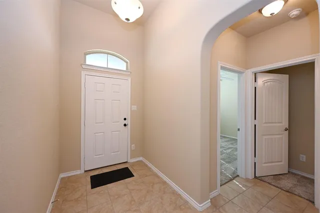 an empty room with window