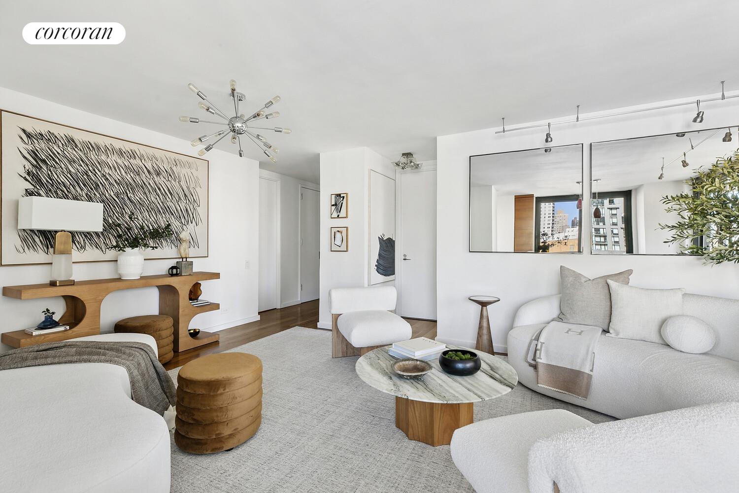 515 East 72nd Street, Unit 11L Manhattan, NY 10021 - Photo 2 of 19 a living room with furniture and a large window