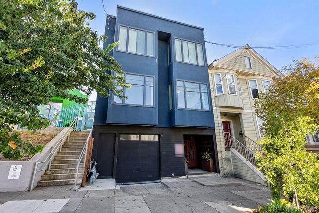 a front view of a house with yard