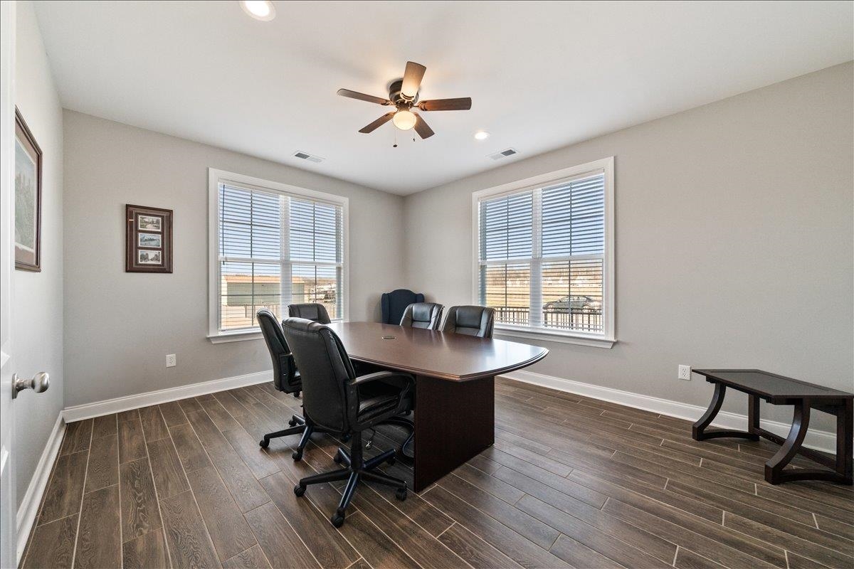 447 Abbey Road, Unit A Munford, TN 38058 - Photo 26 of 30 a workspace with wooden floor and a window