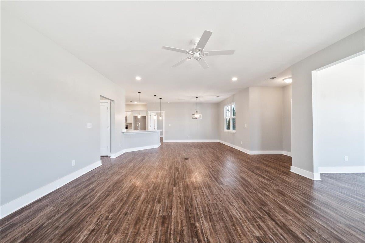 447 Abbey Road, Unit A Munford, TN 38058 - Photo 7 of 30 a view of livingroom with hardwood floor and ceiling fan