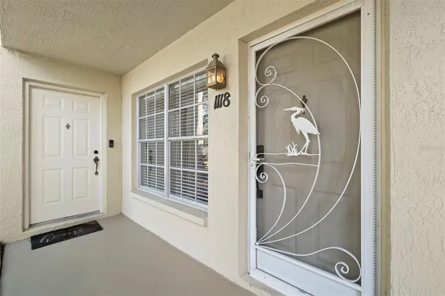 a view of front door with mirror