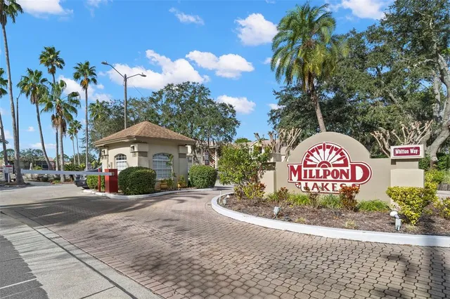 a view of sign board with street view