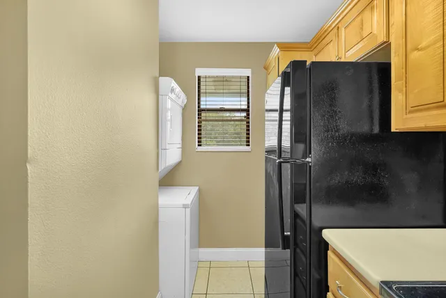 a view of room with window and wooden floor