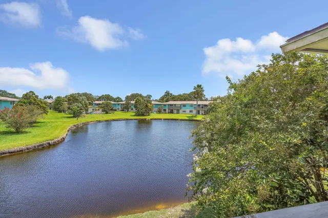 a dining room with furniture and windows