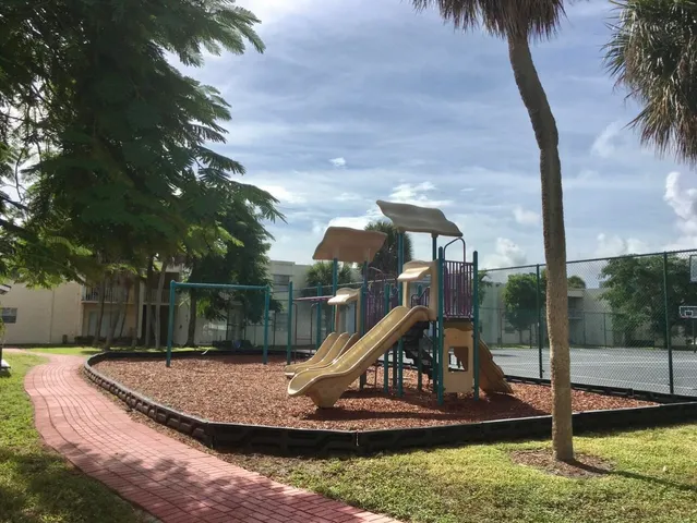 a view of a park with slide