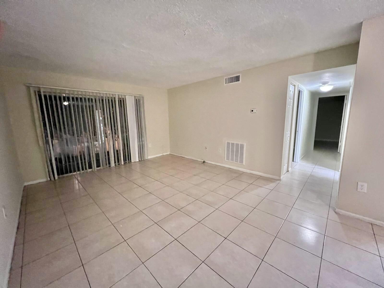 415 Executive Center Drive, Unit 213 West Palm Beach, FL 33401 - Photo 9 of 23 a view of empty room