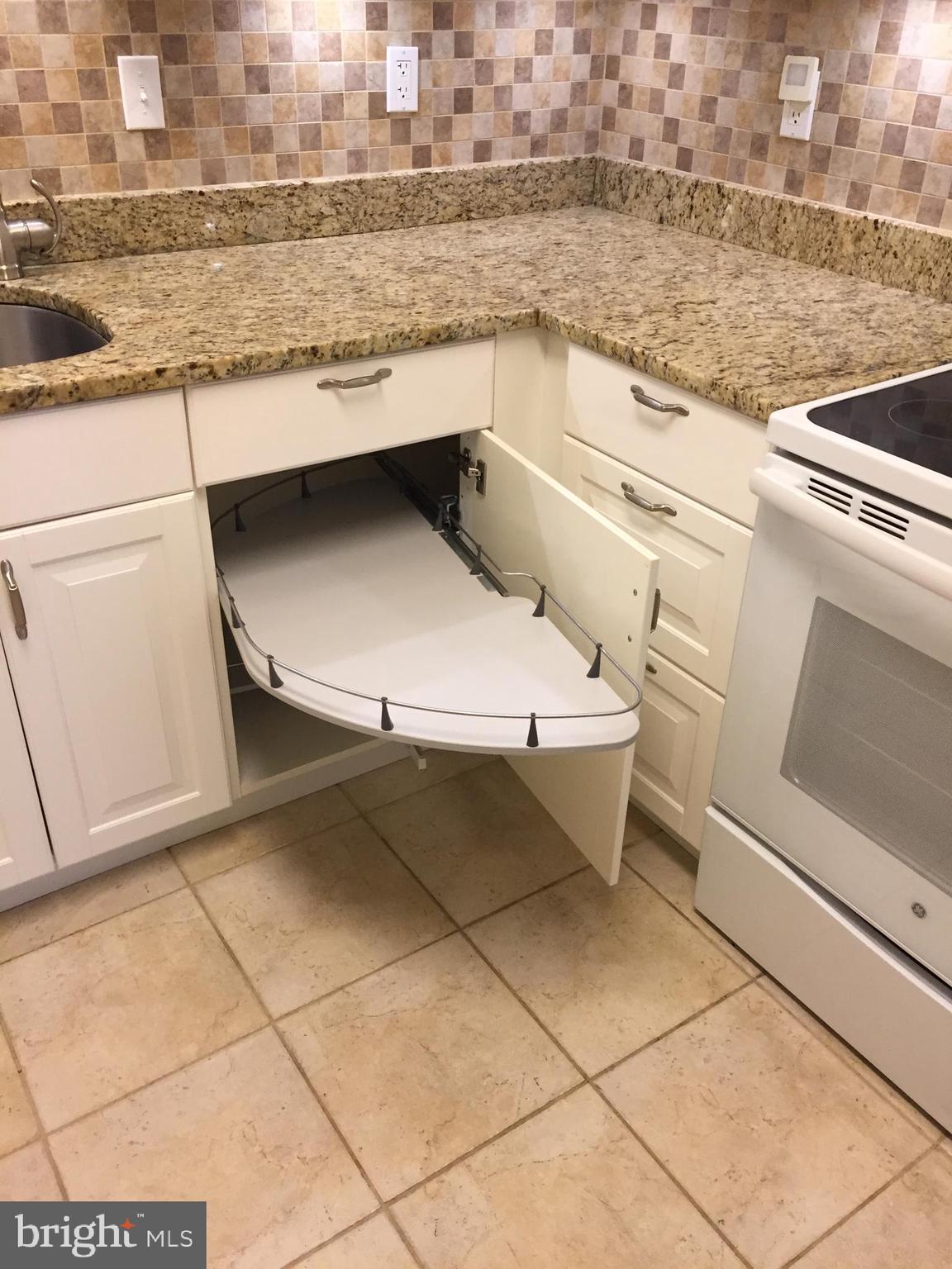 7218 Rolling Road Springfield, VA 22152 - Photo 17 of 37 Pull out Corner Kitchen Drawer