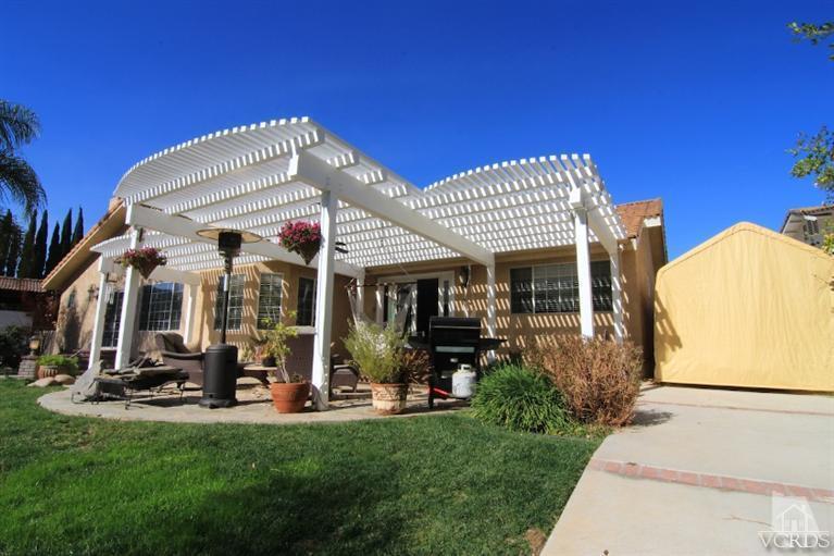 1320 Rambling Road Simi Valley, CA 93065 - Photo 2 of 3 a view of a house with a swimming pool