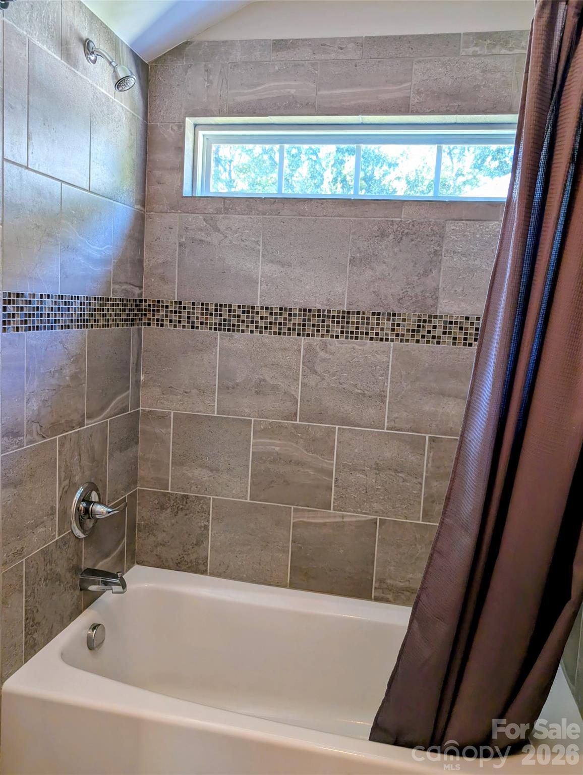 19934 Walter Henderson Road Cornelius, NC 28031 - Photo 23 of 35 a bathroom with a bathtub