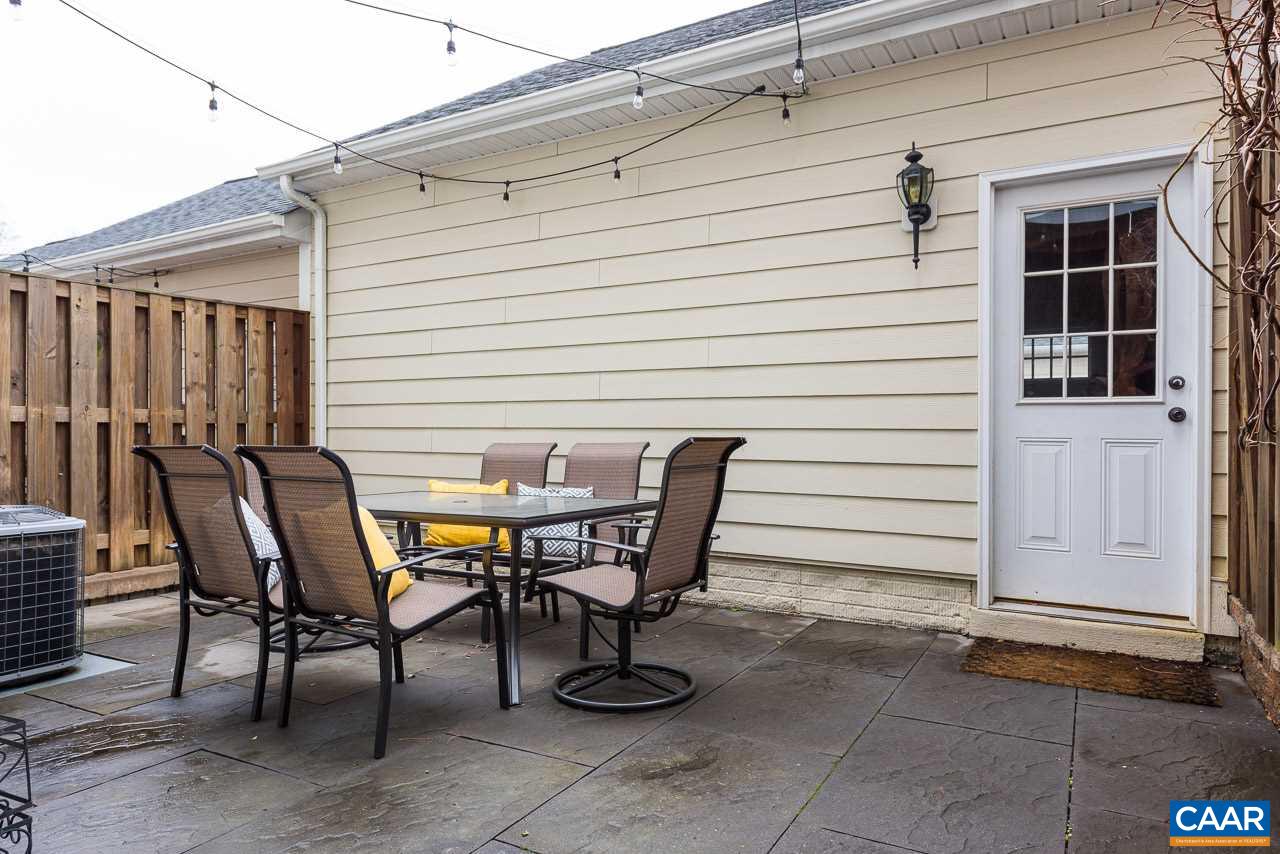 711 Rainier Road Charlottesville, VA 22903 - Photo 5 of 17 a view of a chairs and table in patio