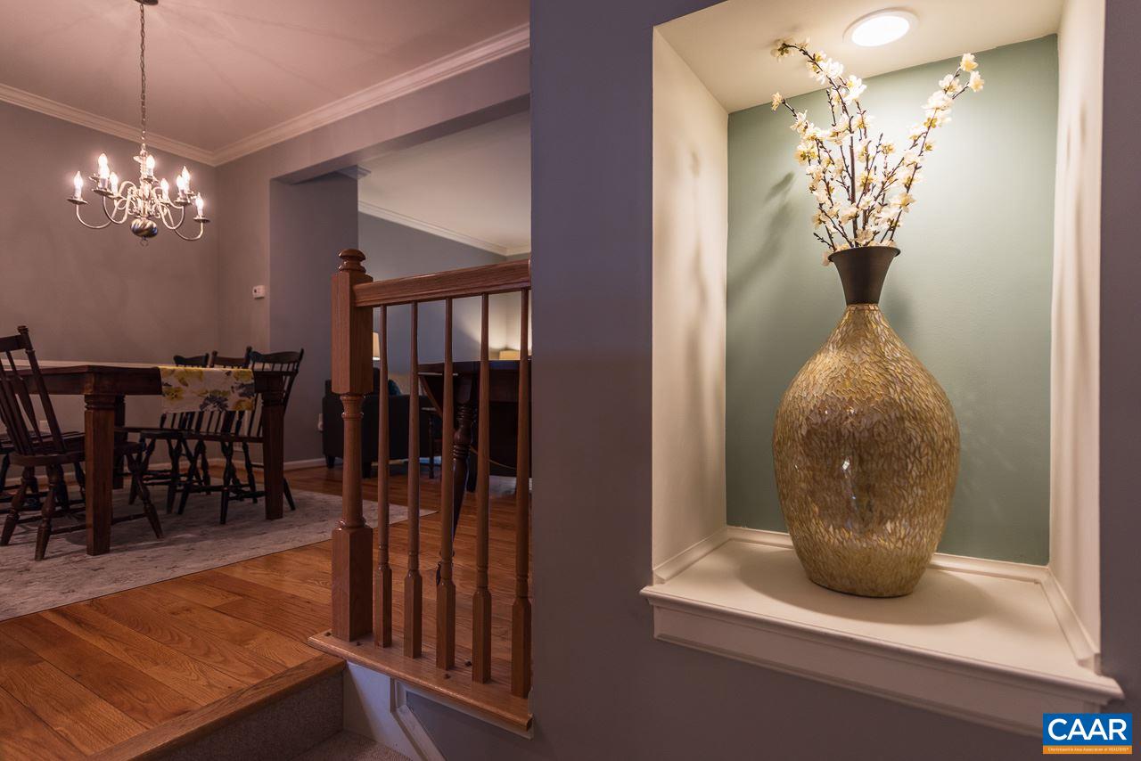 711 Rainier Road Charlottesville, VA 22903 - Photo 6 of 17 a view of a dining room with furniture and wooden floor