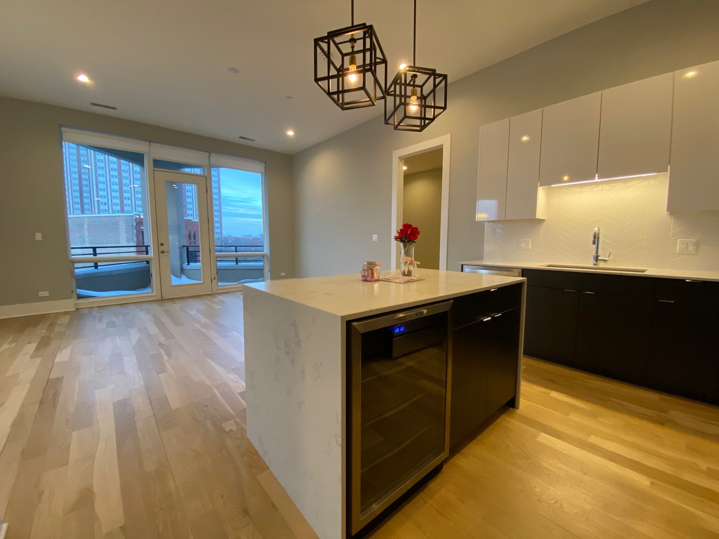 Undisclosed Address Chicago, IL 60612 - Photo 2 of 16 a kitchen with a sink and wooden floor