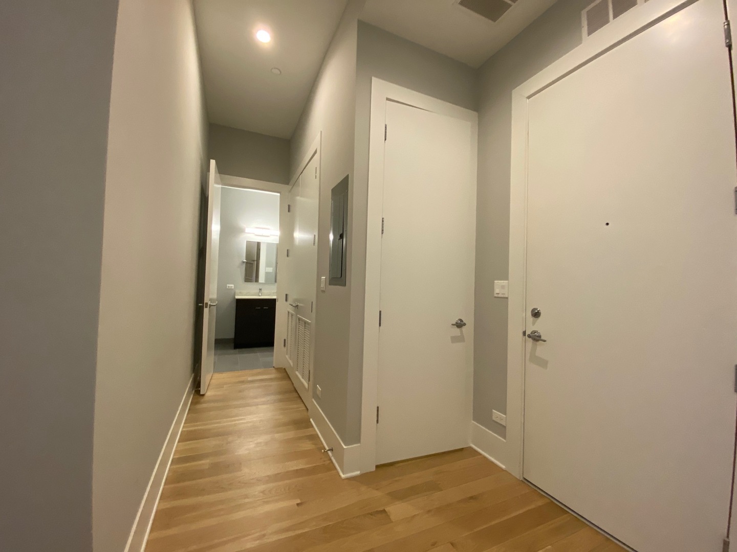 Undisclosed Address Chicago, IL 60612 - Photo 10 of 16 a view of a hallway with wooden floor