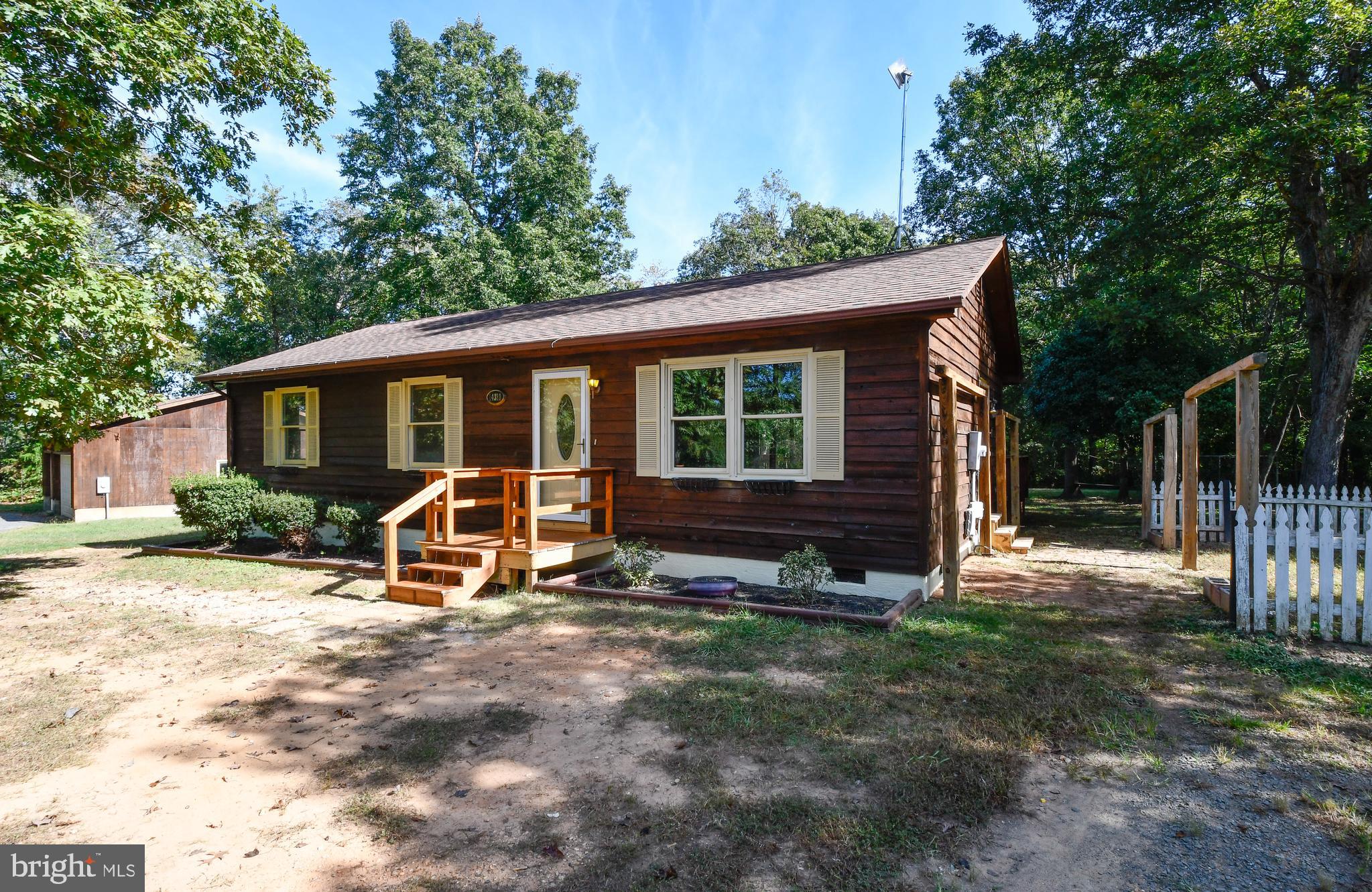 14319 Snake Castle Road Sumerduck, VA 22742 - Photo 2 of 32 Freshly stained exterior of the this cute rambler