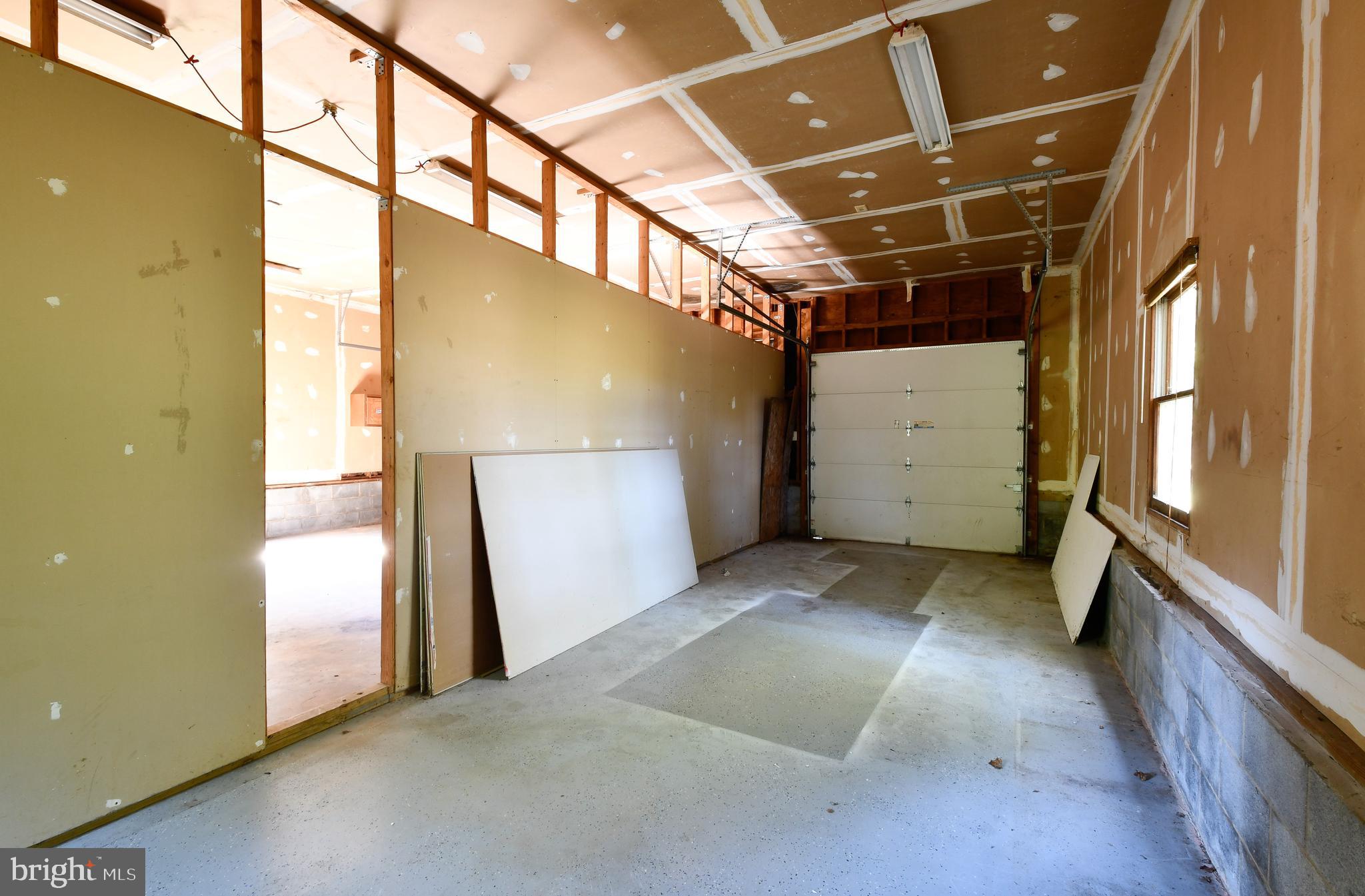 14319 Snake Castle Road Sumerduck, VA 22742 - Photo 31 of 32 Garage interior is divided into two sections