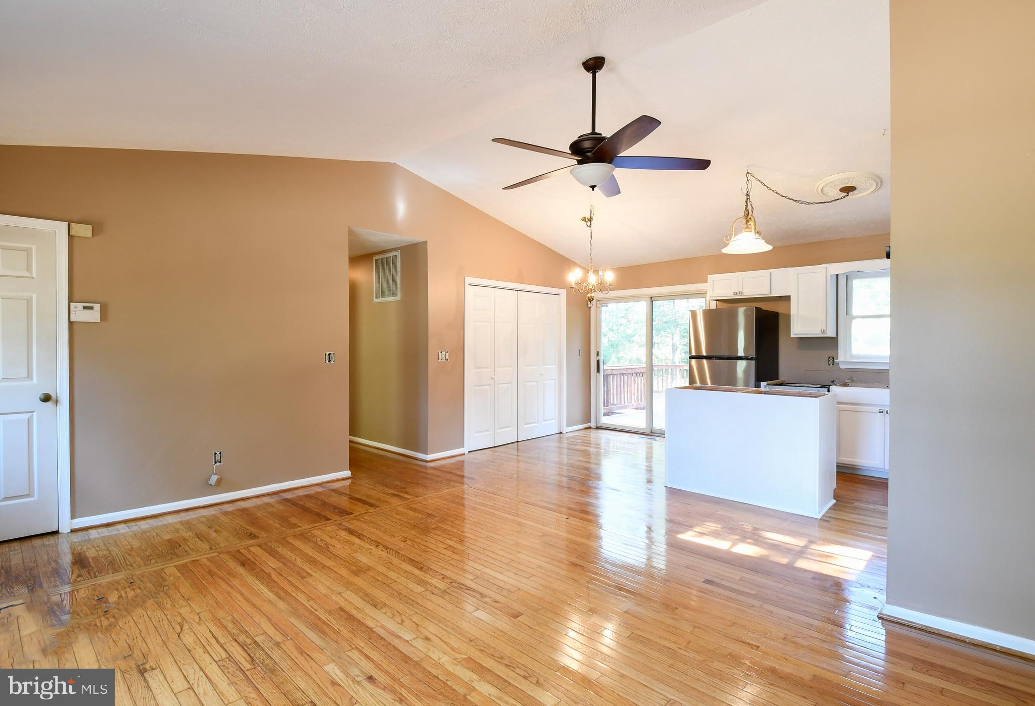 14319 Snake Castle Road Sumerduck, VA 22742 - Photo 5 of 32 Living room is open to dining room and kitchen