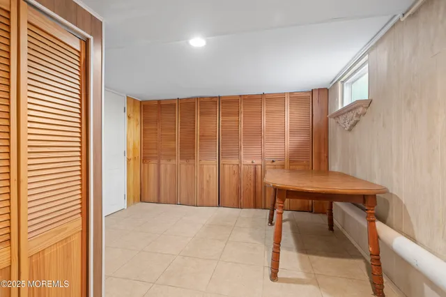 a view of a room with a table and chair