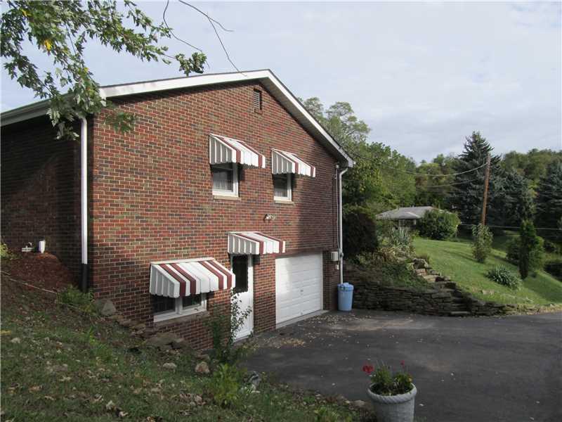 1201 Renton Road Plum, PA 15239 - Photo 18 of 22 Parking Lot/Garage. Integral garage... parking.