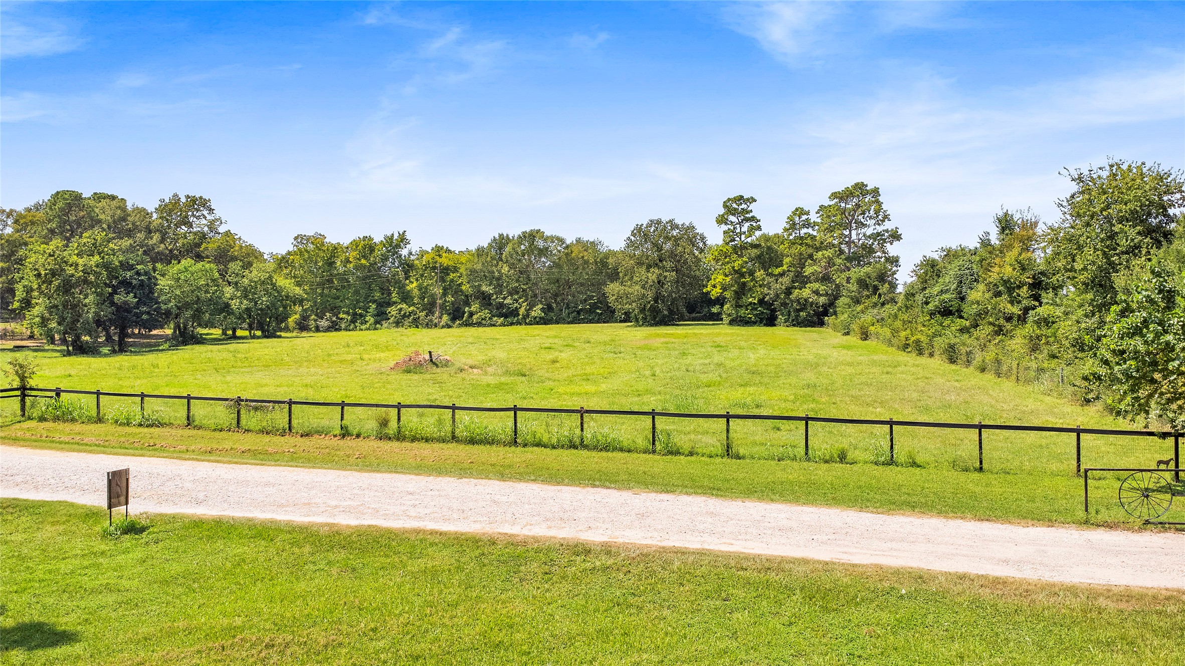 1097 Rd W Willis Tx 77318 Road West Willis, TX 77318 - Photo 5 of 6 a view of a yard