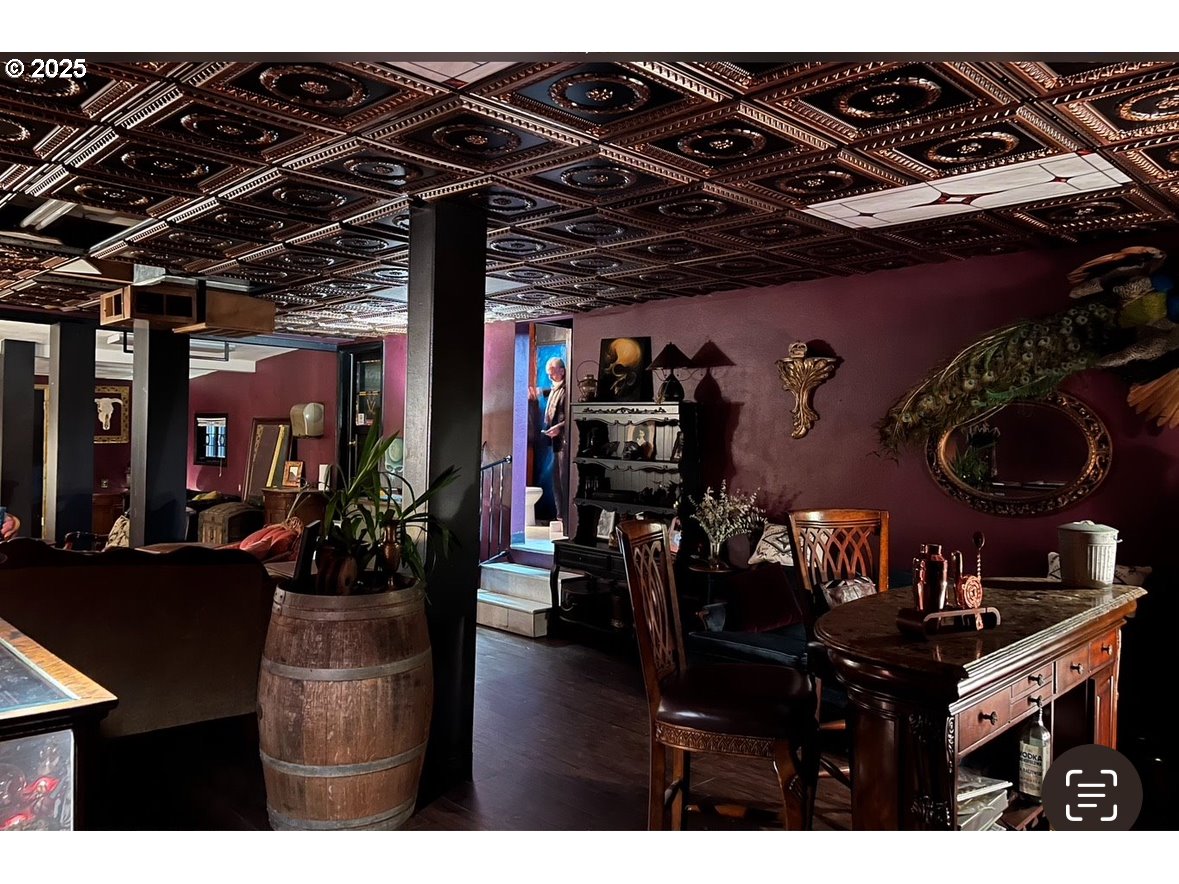 1030 West 5th Avenue Eugene, OR 97402 - Photo 4 of 7 a kitchen view of a dining table and chairs