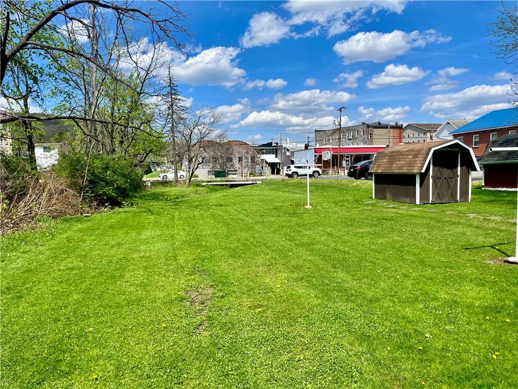 1123 Church Street Indiana, PA 15701 - Photo 17 of 19 a view of a big yard with palm trees