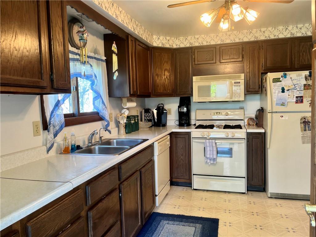 1123 Church Street Indiana, PA 15701 - Photo 4 of 19 a kitchen with a sink cabinets and window