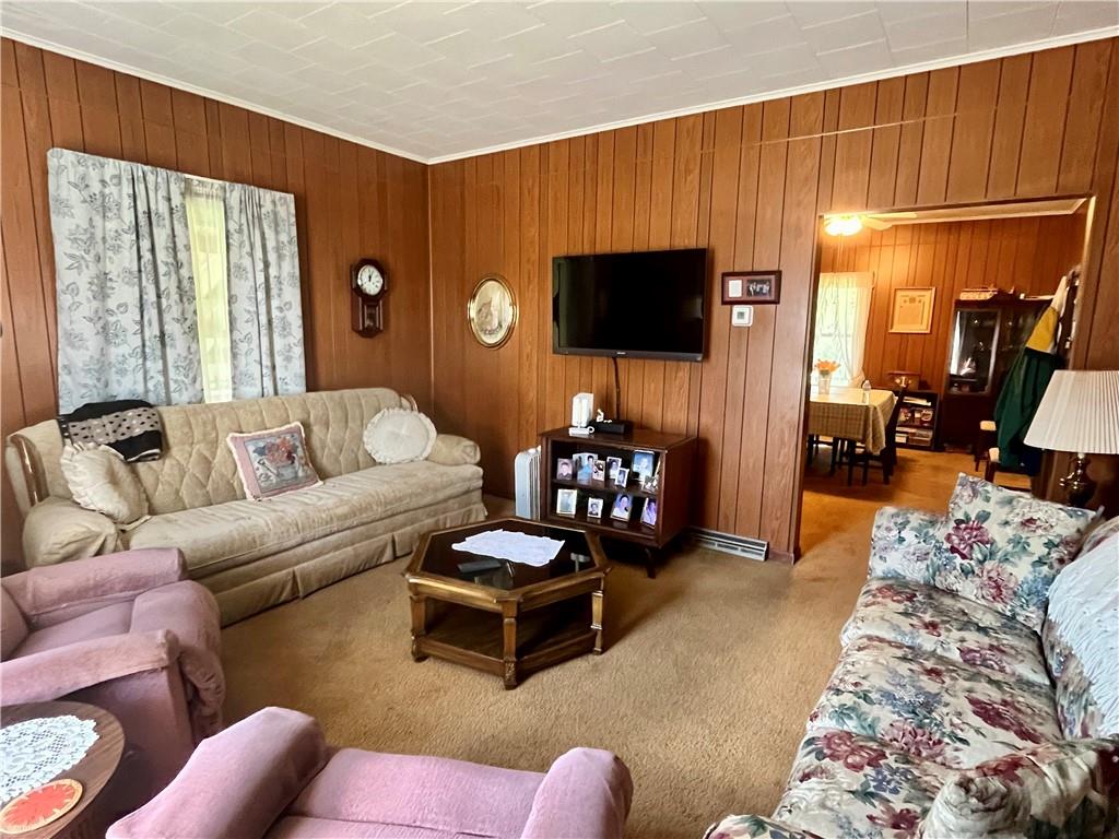1123 Church Street Indiana, PA 15701 - Photo 9 of 19 a living room with furniture a flat screen tv and a window